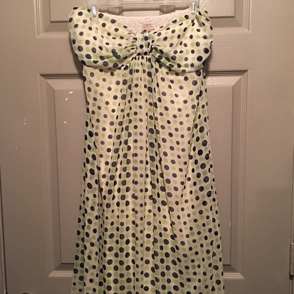 Strapless ivory dress with polka dot detail